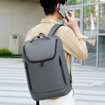 Mochila Portátil Impermeable con Puerto USB y Compartimento para Laptop